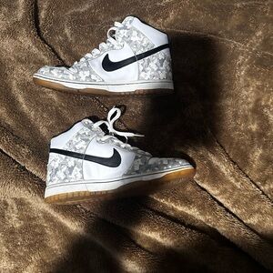 Nike White and Black High-Top Sneakers with Classic Design